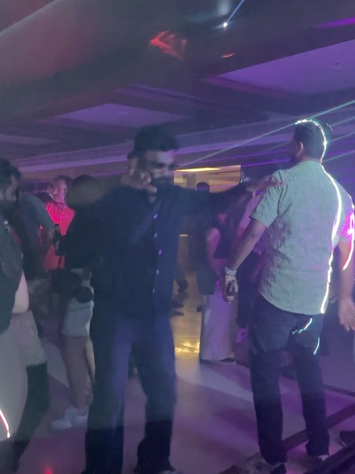 Gossip nightclub dance floor with purple lights and crowd